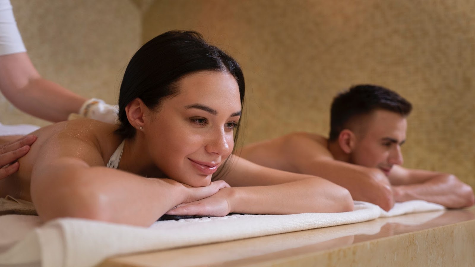 A man and woman receiving a massage