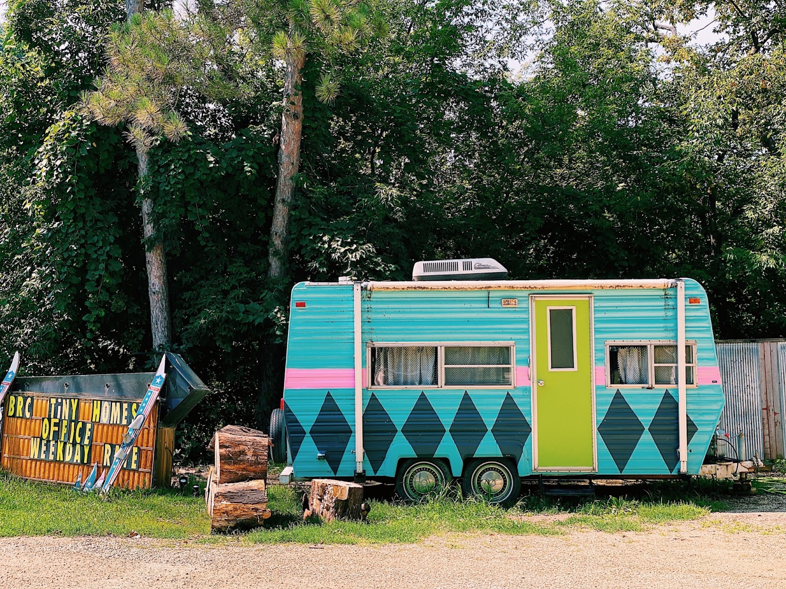 a colorful rv in nature